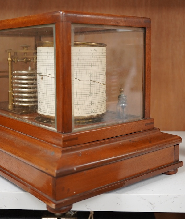 An early 20th century teak cased barograph by Ross, London No.A.529. with drawer underneath containing the original leaflet, spare papers, etc. Condition - fair to good.